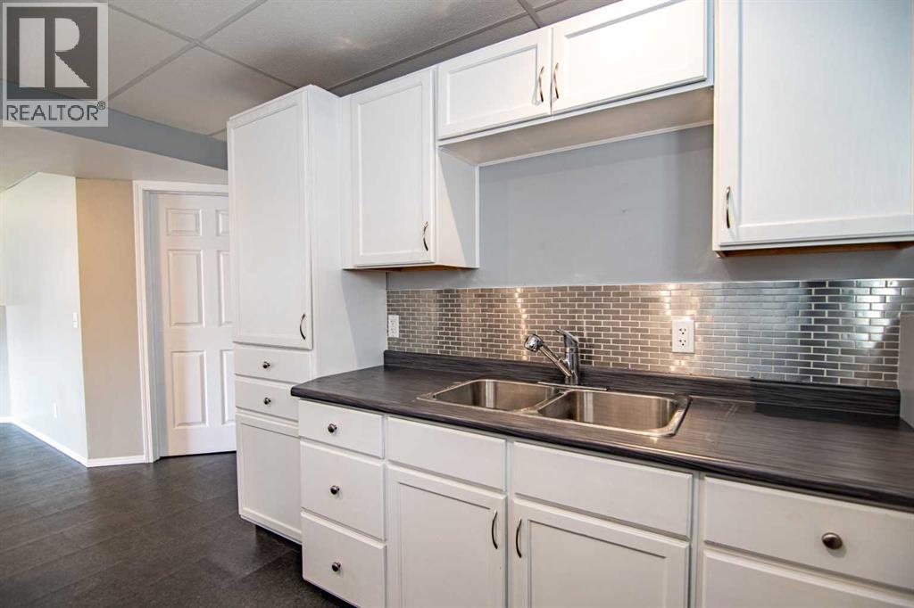 61 Mann Drive, Penhold, Alberta  T0M 1R0 - Photo 43 - A2248337