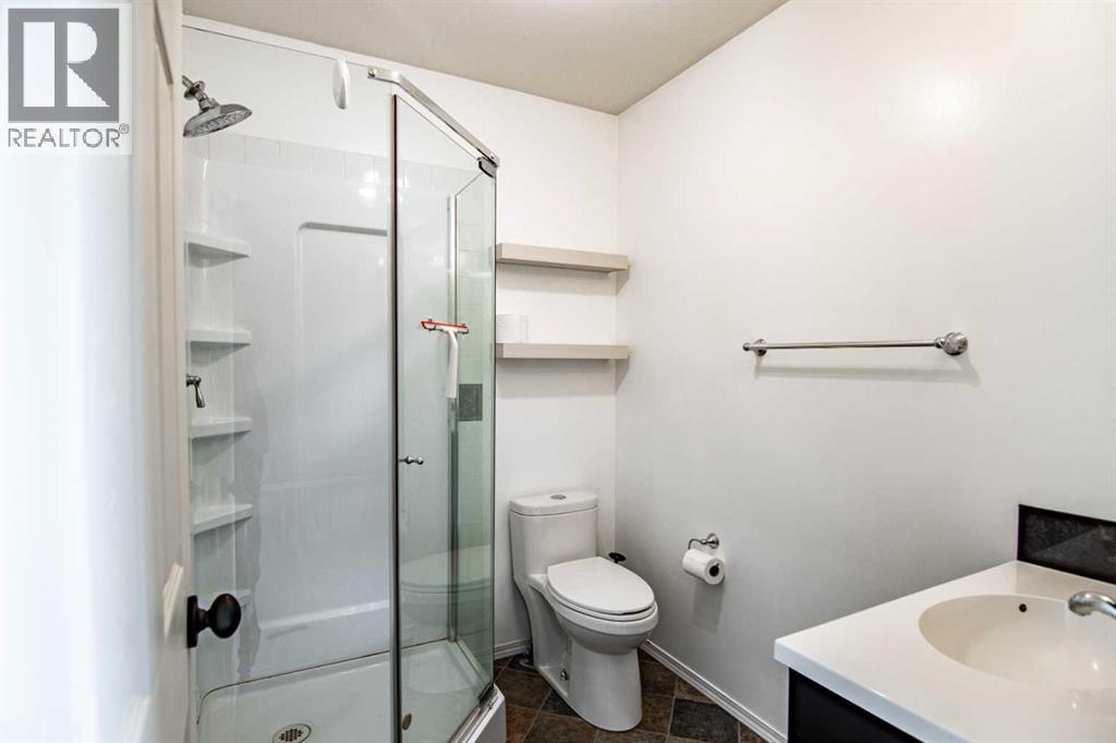 61 Mann Drive, Penhold, Alberta  T0M 1R0 - Photo 33 - A2248337