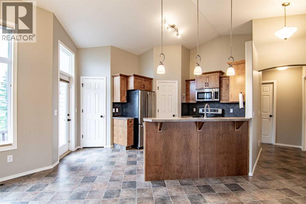 61 Mann Drive, Penhold, Alberta  T0M 1R0 - Photo 22 - A2248337