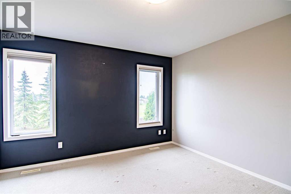 61 Mann Drive, Penhold, Alberta  T0M 1R0 - Photo 30 - A2248337