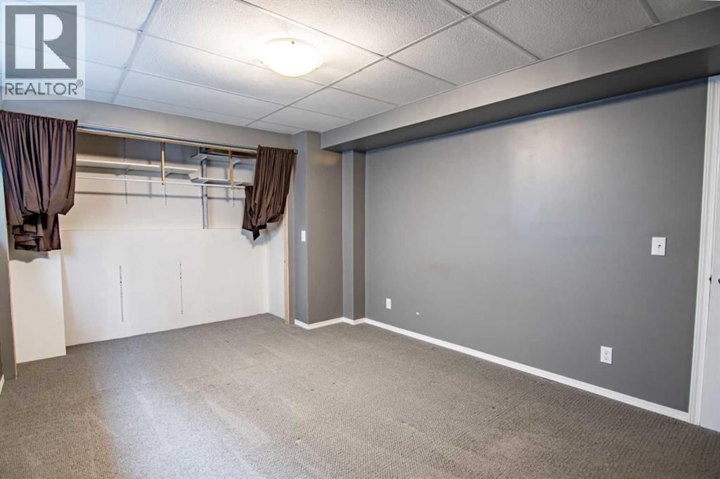 61 Mann Drive, Penhold, Alberta  T0M 1R0 - Photo 47 - A2248337