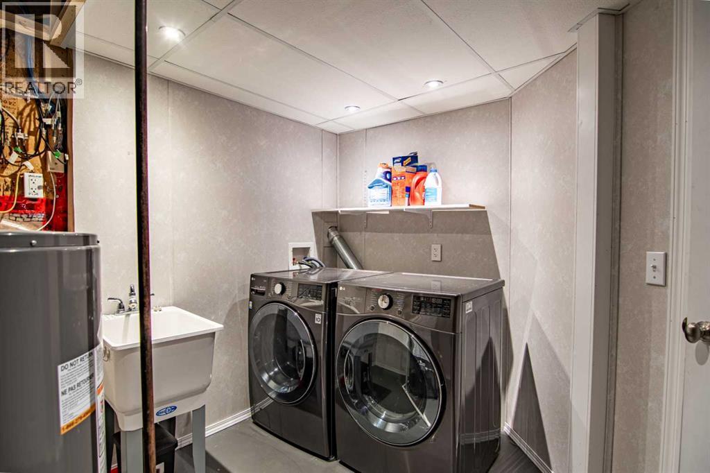 61 Mann Drive, Penhold, Alberta  T0M 1R0 - Photo 49 - A2248337