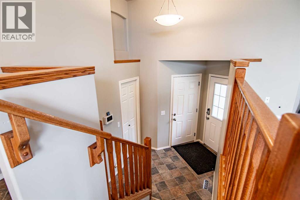 61 Mann Drive, Penhold, Alberta  T0M 1R0 - Photo 35 - A2248337