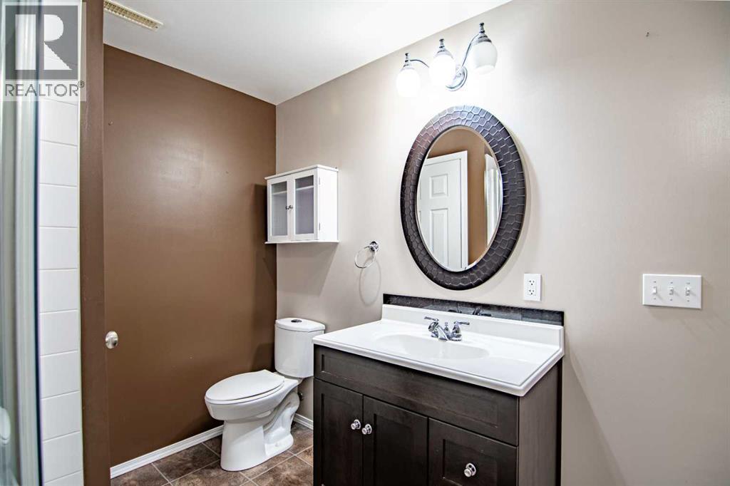 61 Mann Drive, Penhold, Alberta  T0M 1R0 - Photo 45 - A2248337