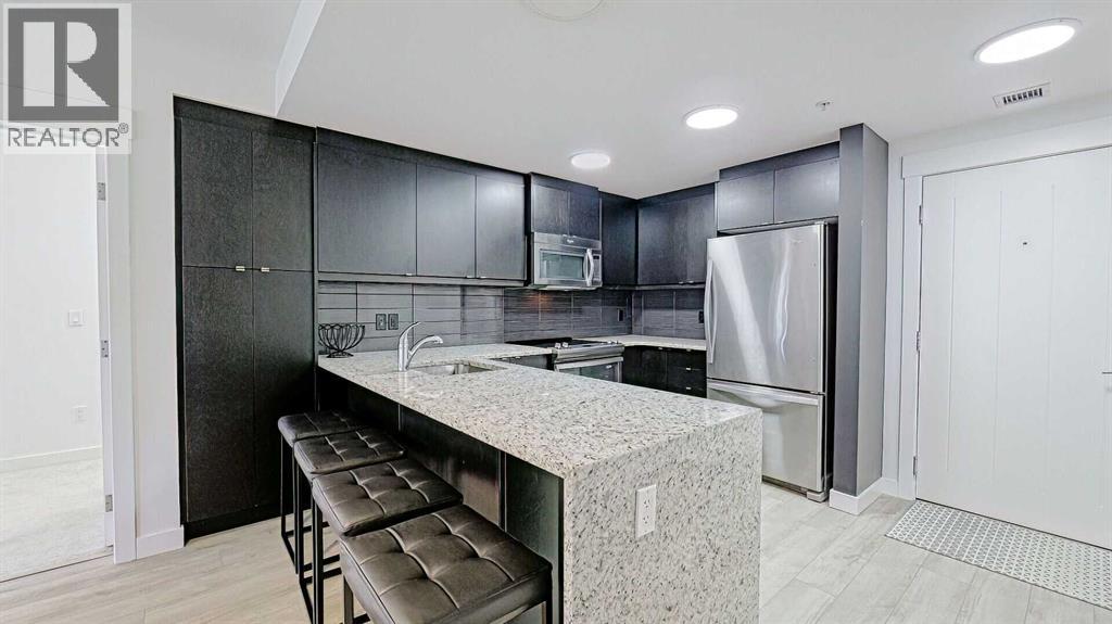 122, 15 Aspenmont Heights Sw, Calgary, Alberta  T3H 0E3 - Photo 6 - A2214621