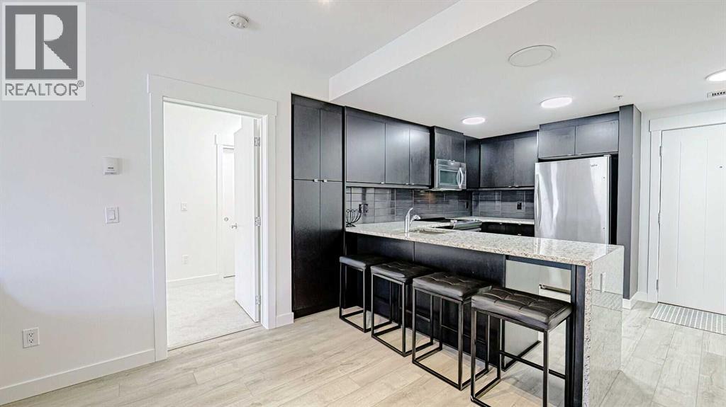 122, 15 Aspenmont Heights Sw, Calgary, Alberta  T3H 0E3 - Photo 5 - A2214621