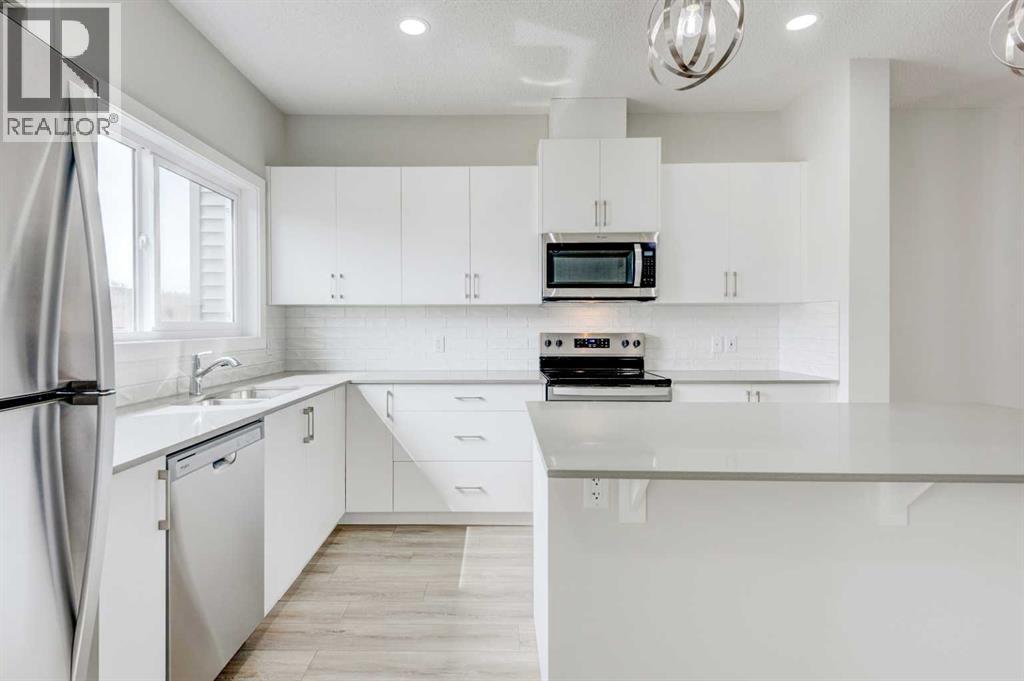 166 Creekview Gardens Sw, Calgary, Alberta  T2X 5X8 - Photo 9 - A2215819