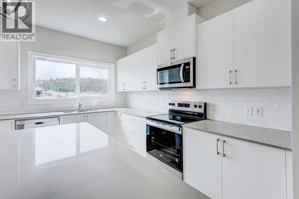 166 Creekview Gardens Sw, Calgary, Alberta  T2X 5X8 - Photo 10 - A2215819