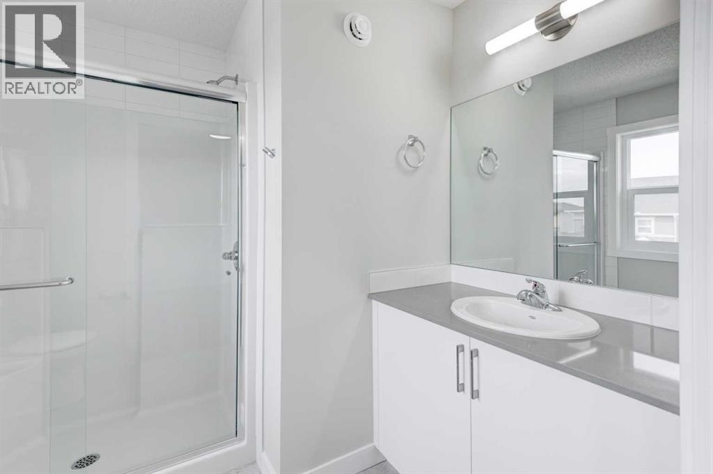 166 Creekview Gardens Sw, Calgary, Alberta  T2X 5X8 - Photo 35 - A2215819