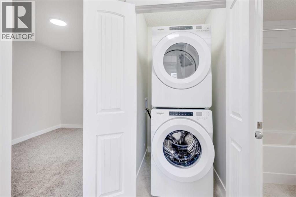 166 Creekview Gardens Sw, Calgary, Alberta  T2X 5X8 - Photo 37 - A2215819