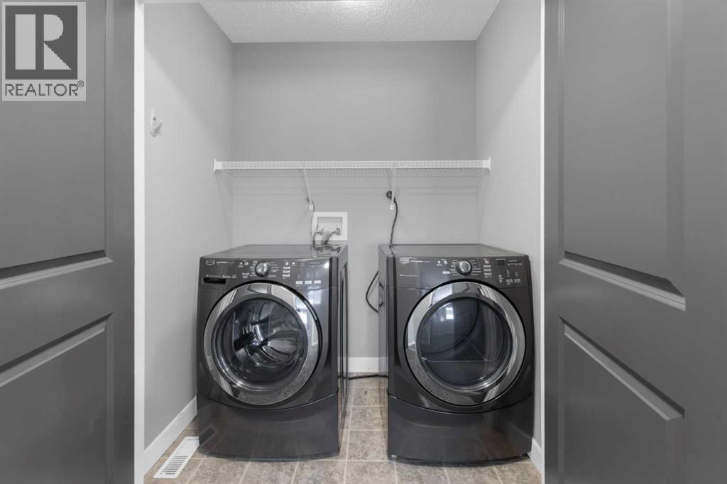 57 Evanscove Manor Nw, Calgary, Alberta  T3P 0E5 - Photo 28 - A2256153