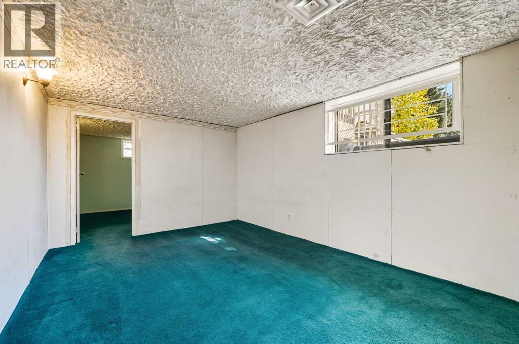 1048 39 Avenue Nw, Calgary, Alberta  T2K 0E1 - Photo 25 - A2259464