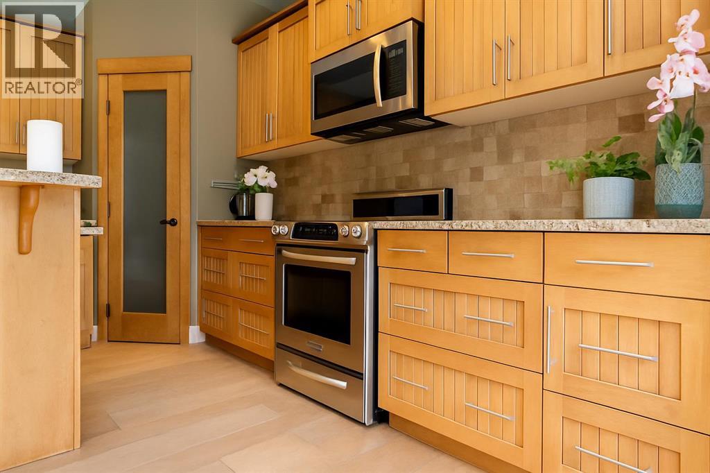 52 Elmont Green Sw, Calgary, Alberta  T3H 5Y4 - Photo 12 - A2257526