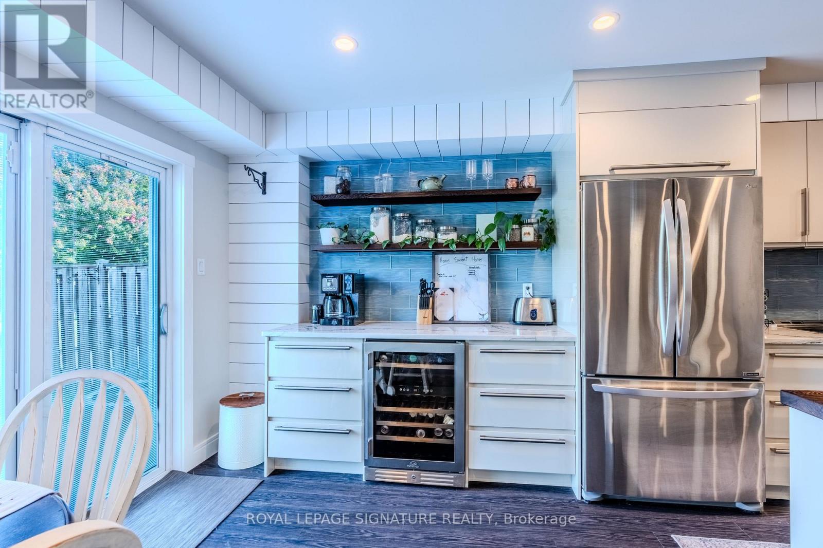 109 Maplewood Drive, Essa, Ontario  L3W 0B7 - Photo 6 - N12498784