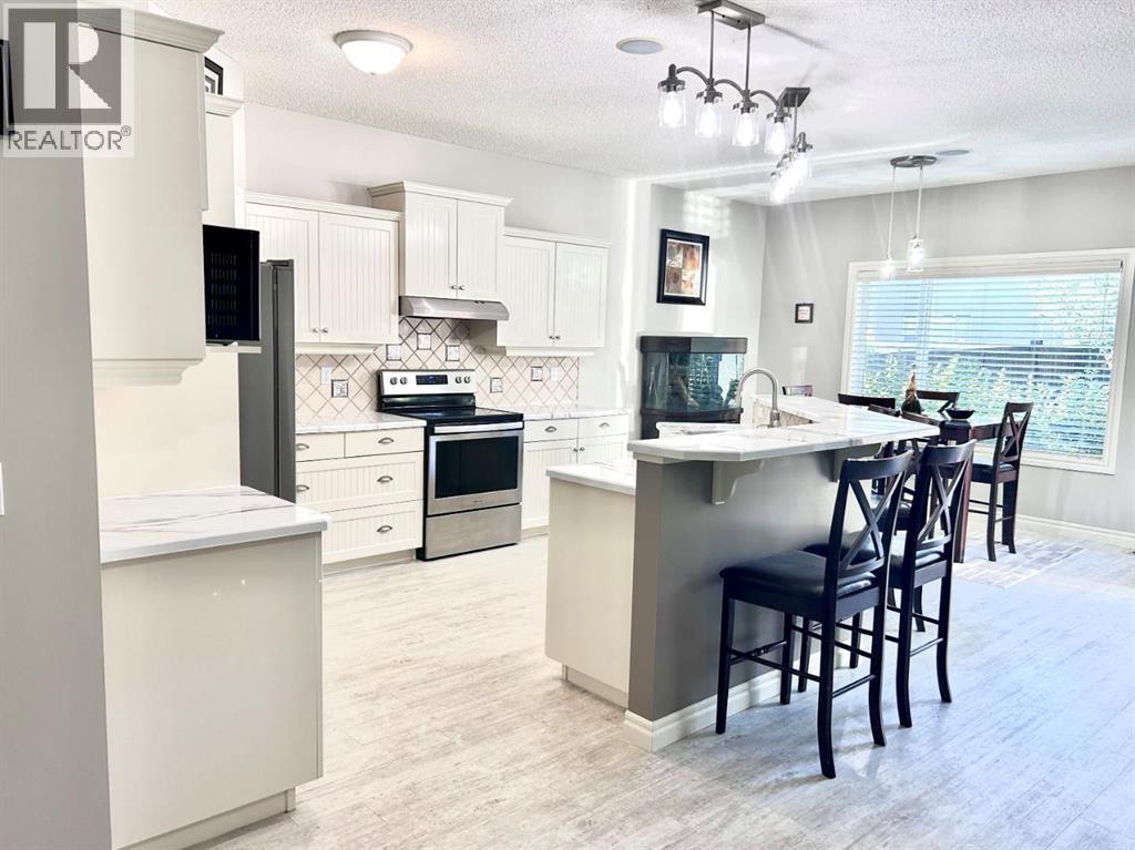 112 Panamount Green Nw, Calgary, Alberta  T3K 5R7 - Photo 6 - A2243693