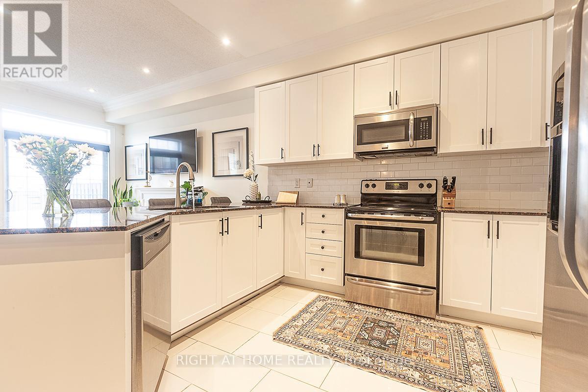 59 - 745 Farmstead Drive, Milton, Ontario  L9T 8B1 - Photo 12 - W12498944