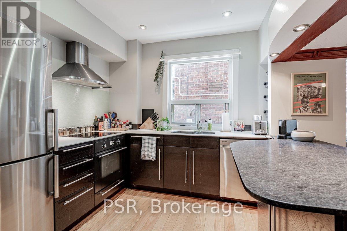 Main - 50 Parkdale Road, Toronto, Ontario  M6R 1E2 - Photo 5 - W12499400