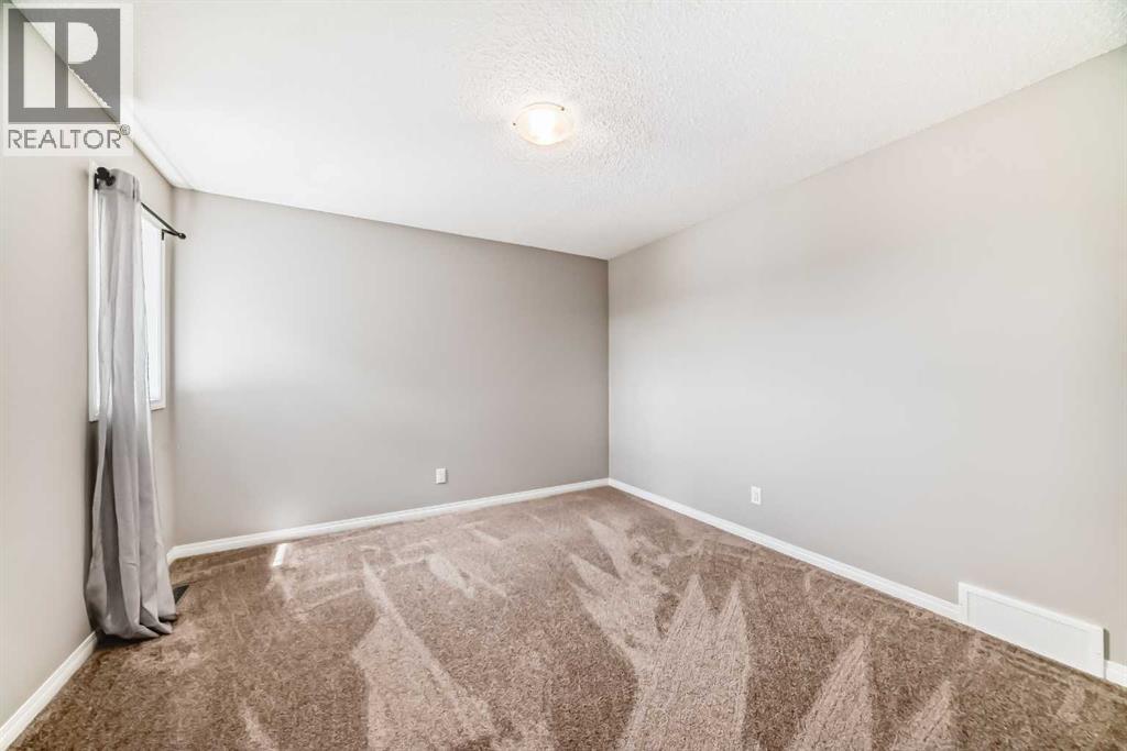 210 Heartland Avenue, Cochrane, Alberta  T4C 2P9 - Photo 35 - A2235652