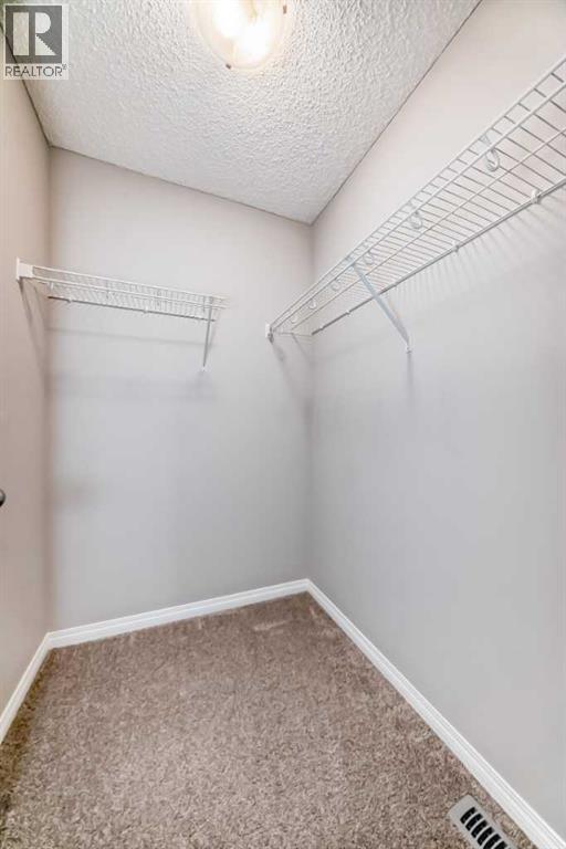 210 Heartland Avenue, Cochrane, Alberta  T4C 2P9 - Photo 37 - A2235652