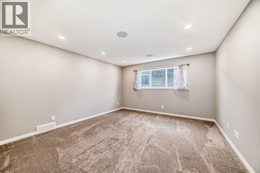 210 Heartland Avenue, Cochrane, Alberta  T4C 2P9 - Photo 39 - A2235652