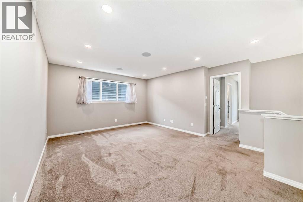 210 Heartland Avenue, Cochrane, Alberta  T4C 2P9 - Photo 40 - A2235652