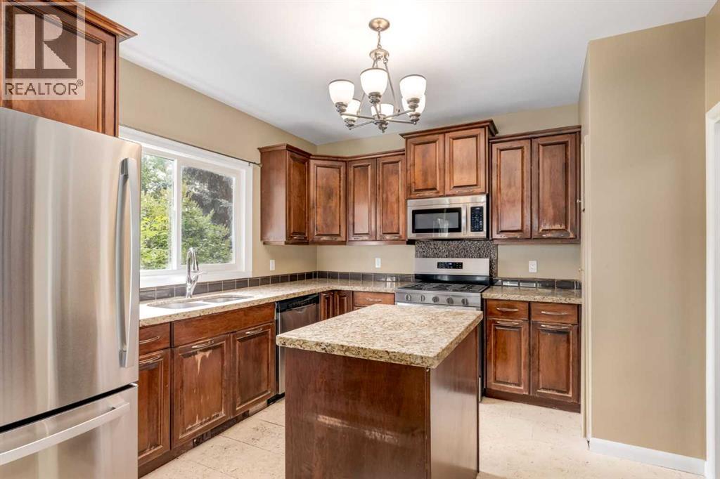 911 80 Avenue Sw, Calgary, Alberta  T2V 0V4 - Photo 9 - A2265208