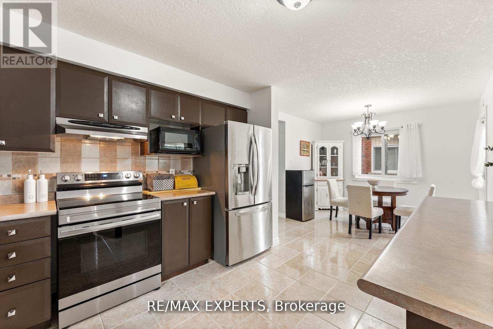 56 Steepleridge Street, Kitchener, Ontario  N2P 2W3 - Photo 14 - X12442317