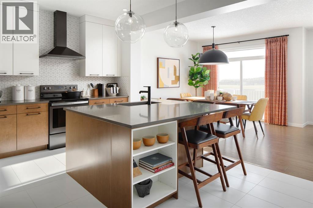 57 Creekside Avenue Sw, Calgary, Alberta  T2X 3B3 - Photo 3 - A2267524