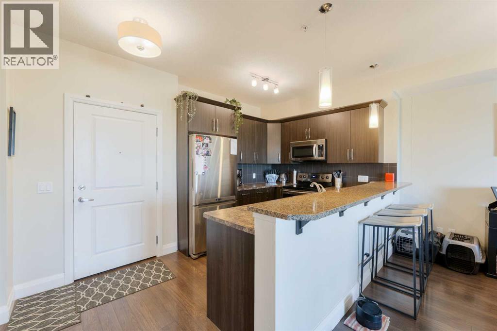 2105, 15 Sunset Square, Cochrane, Alberta  T4C 0E7 - Photo 2 - A2253678