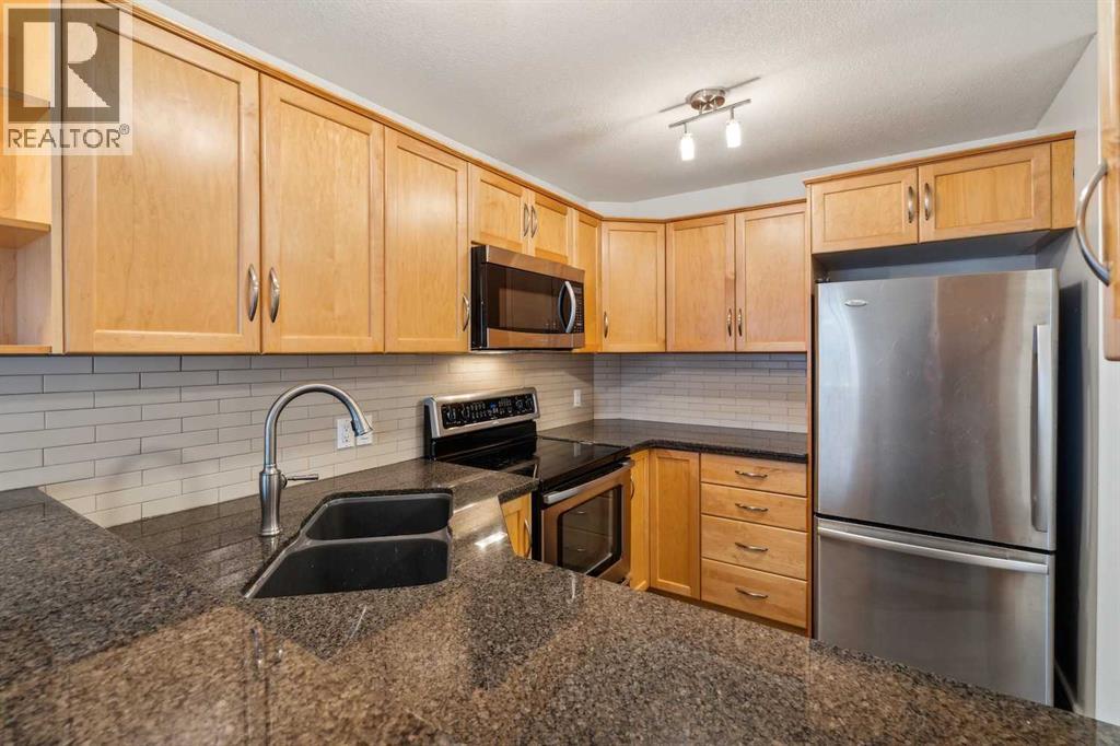 113, 34 Glamis Green Sw, Calgary, Alberta  T3E 6V1 - Photo 25 - A2239168