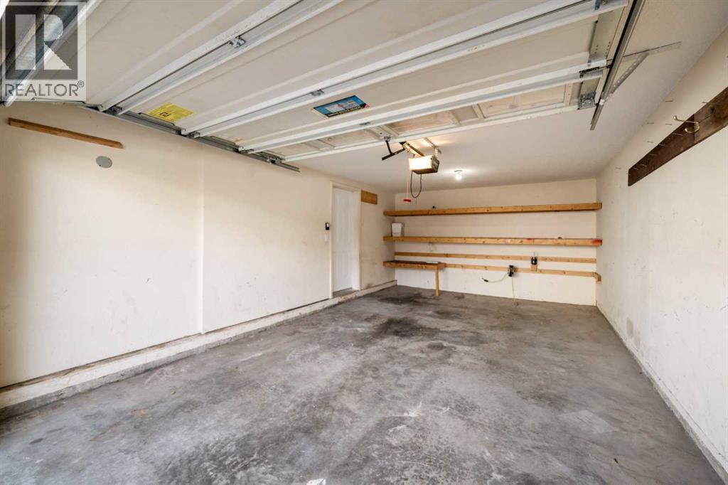 70 Crystal Shores Cove, Okotoks, Alberta  T1S 2B4 - Photo 23 - A2260860