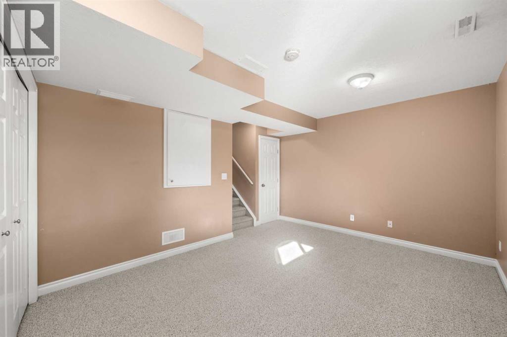 70 Crystal Shores Cove, Okotoks, Alberta  T1S 2B4 - Photo 22 - A2260860