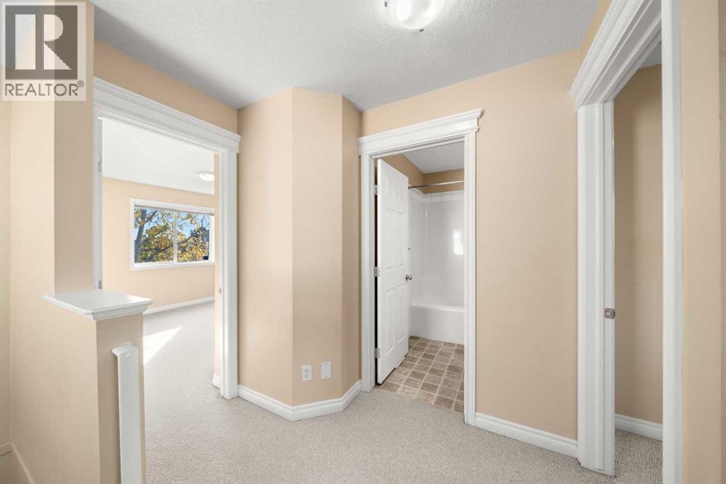 70 Crystal Shores Cove, Okotoks, Alberta  T1S 2B4 - Photo 14 - A2260860