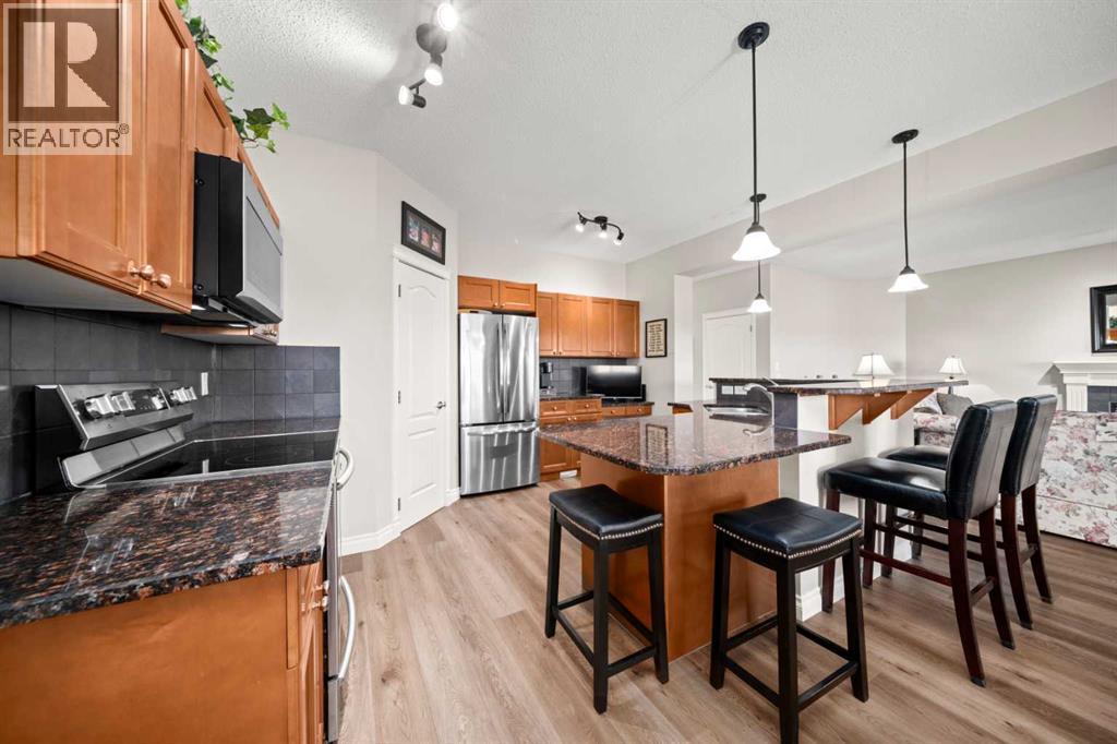 201 Westmount Bay, Okotoks, Alberta  T1S 0B5 - Photo 15 - A2267401