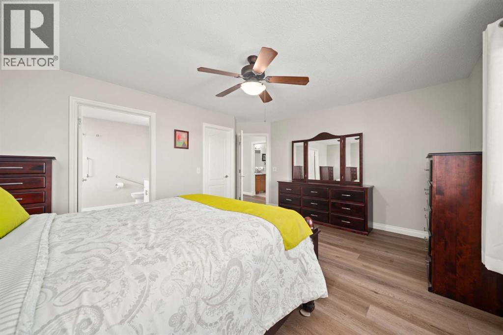 201 Westmount Bay, Okotoks, Alberta  T1S 0B5 - Photo 26 - A2267401