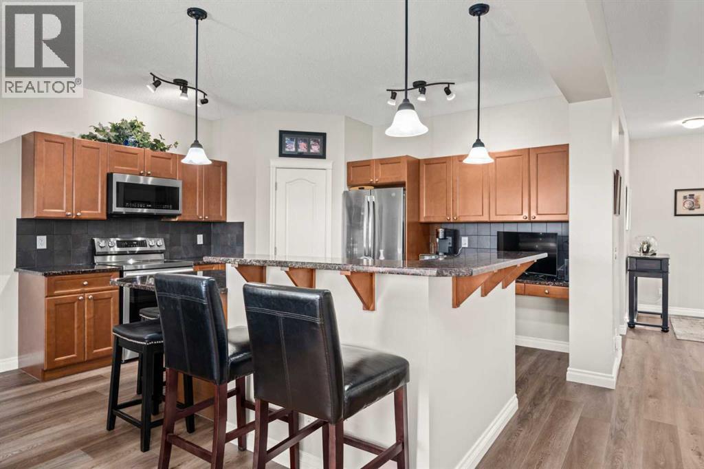 201 Westmount Bay, Okotoks, Alberta  T1S 0B5 - Photo 13 - A2267401
