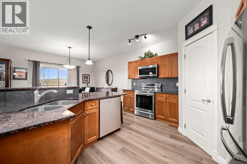 201 Westmount Bay, Okotoks, Alberta  T1S 0B5 - Photo 14 - A2267401