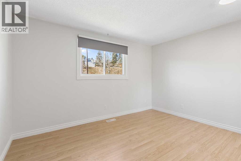 1452 Lake Sylvan Drive Se, Calgary, Alberta  T2J 3C8 - Photo 11 - A2265205