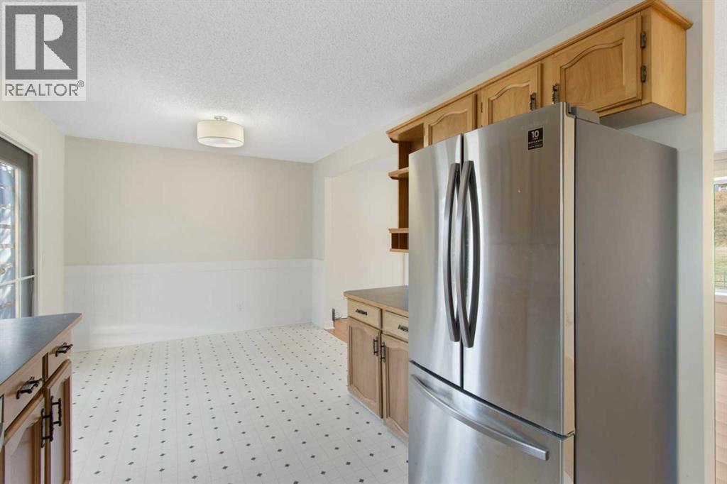 1452 Lake Sylvan Drive Se, Calgary, Alberta  T2J 3C8 - Photo 9 - A2265205