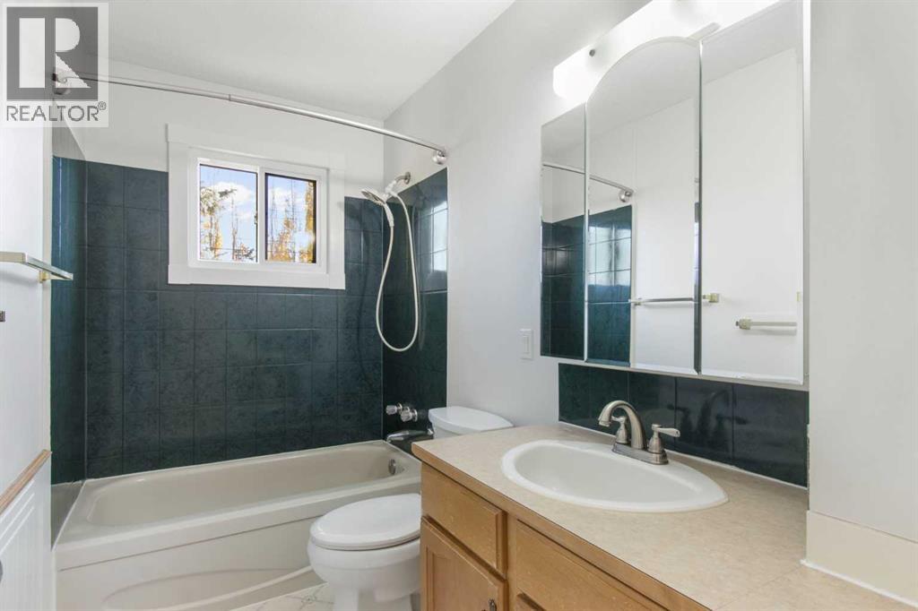 1452 Lake Sylvan Drive Se, Calgary, Alberta  T2J 3C8 - Photo 6 - A2265205