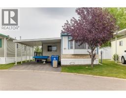 69, 99 Arbour Lake Road NW Arbour Lake