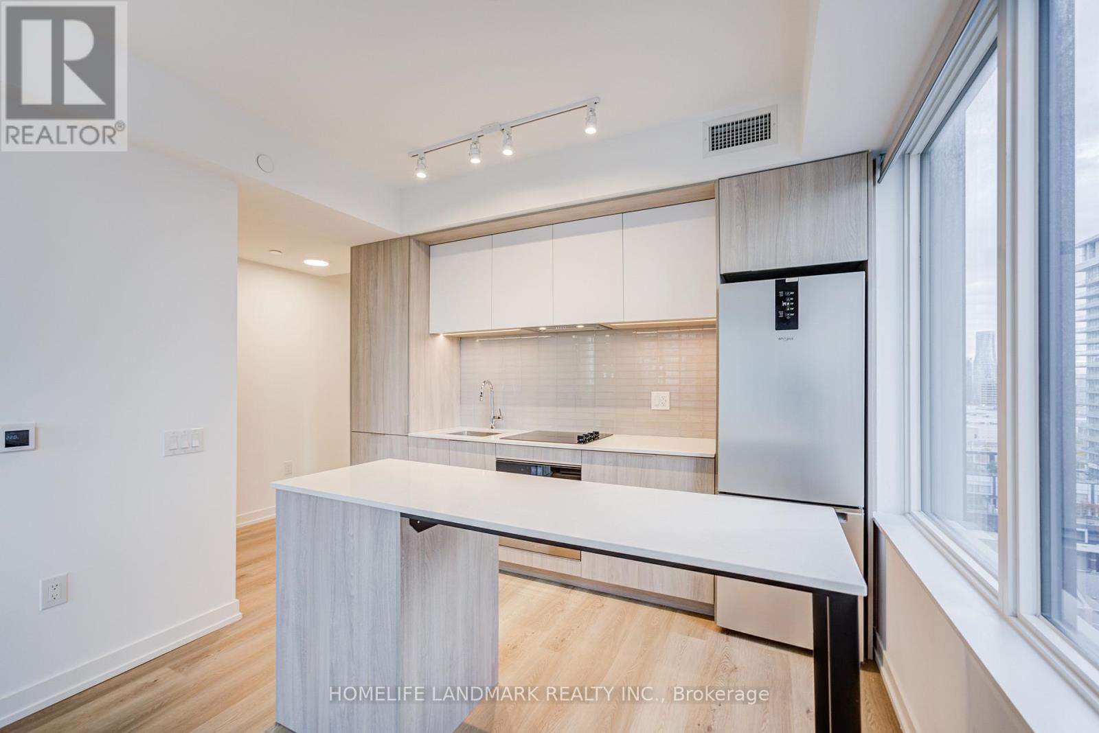 1208 - 395 Square One Drive, Mississauga, Ontario  L5B 0P6 - Photo 4 - W12498252