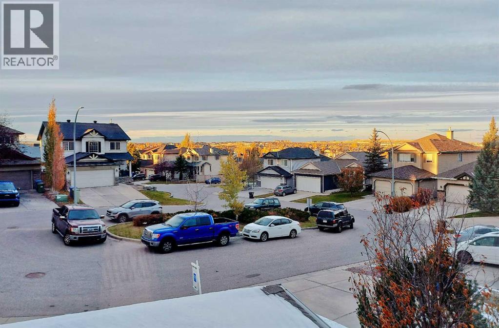133 Panamount Court Nw, Calgary, Alberta  T3K 5S1 - Photo 1 - A2257304