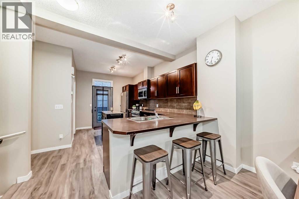 49 New Brighton Point Se, Calgary, Alberta T2Z 1B6 - Photo 3 - A2259395