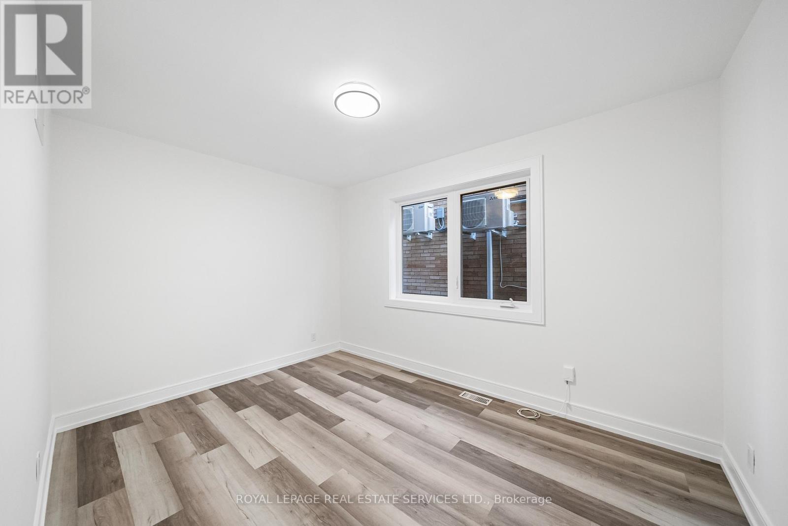 2 - 50 Arcadian Circle, Toronto, Ontario  M8W 2Y9 - Photo 9 - W12456045