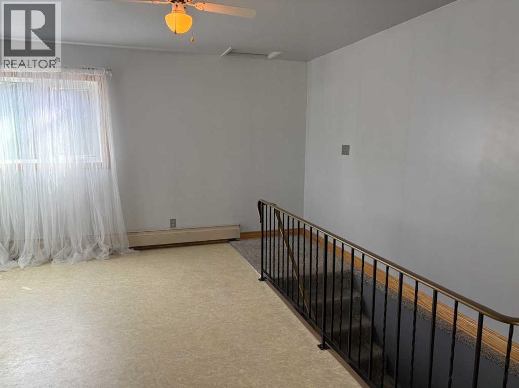 73 Kirby Place Sw, Calgary, Alberta  T2V 2K7 - Photo 6 - A2238186