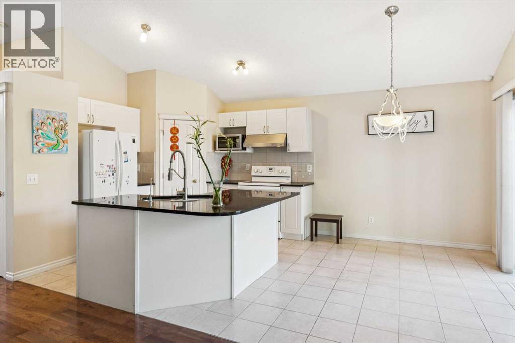 1048 Bridlemeadows Manor Sw, Calgary, Alberta  T2Y 4K9 - Photo 8 - A2262295