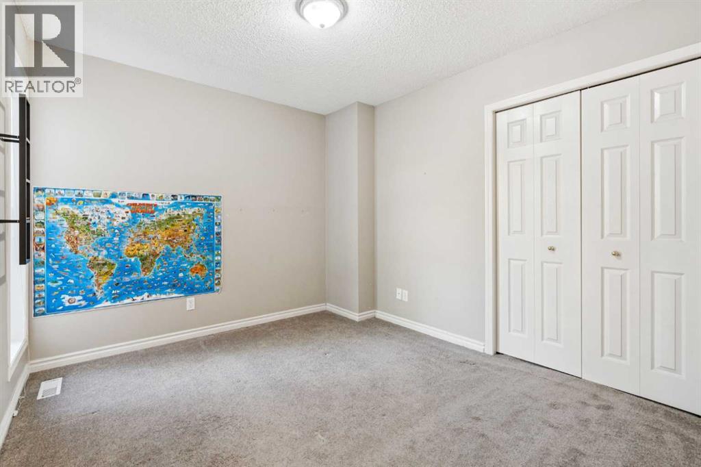 1048 Bridlemeadows Manor Sw, Calgary, Alberta  T2Y 4K9 - Photo 19 - A2262295