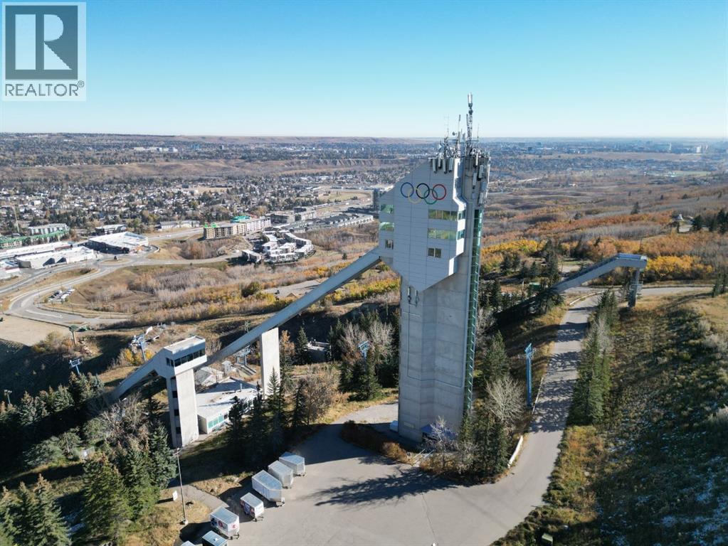 64 Cougarstone Square Sw, Calgary, Alberta  T3H 5J4 - Photo 3 - A2262348