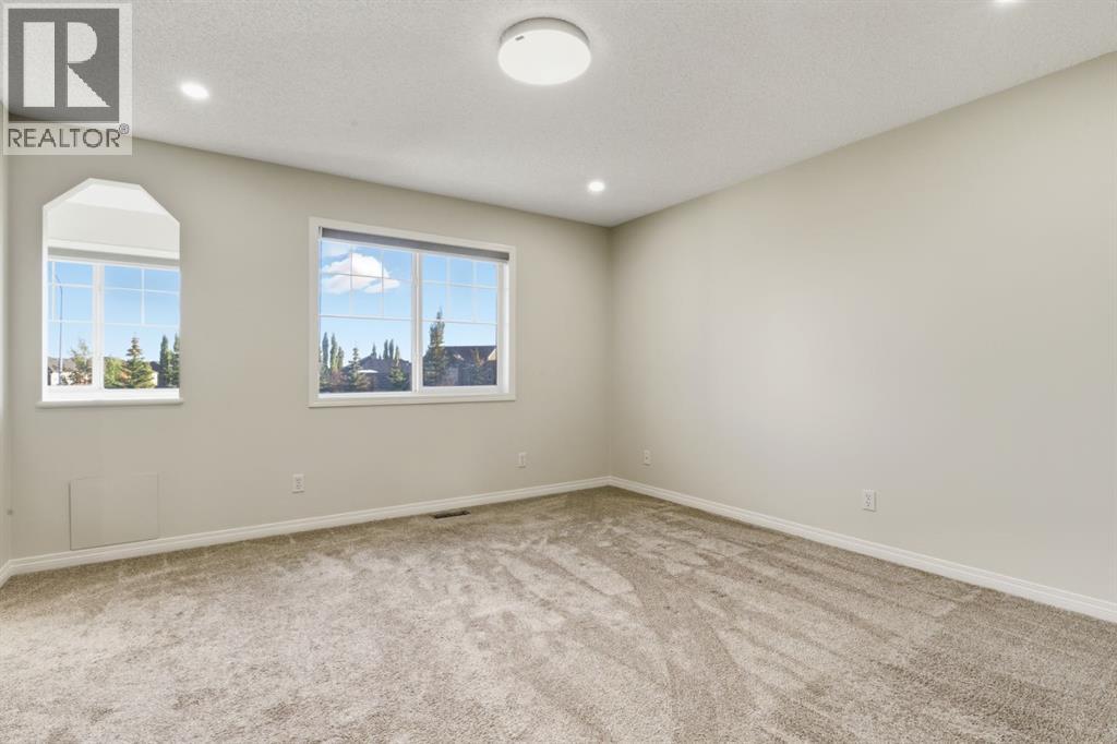 64 Cougarstone Square Sw, Calgary, Alberta  T3H 5J4 - Photo 22 - A2262348